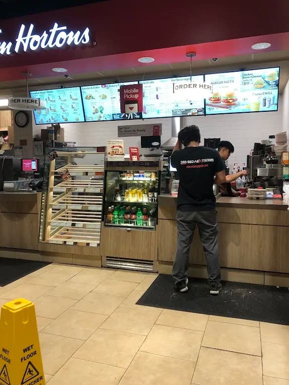 Tim Hortons storefront and interior at 450 Derry Rd West, Mississauga, ON