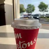 Tim Hortons storefront and interior at 1520 Aimco Blvd, Mississauga, ON