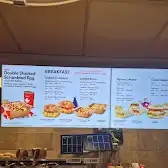 Tim Hortons storefront and interior at 2165 Royal Windsor Dr, Mississauga, ON