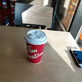 Tim Hortons storefront and interior at 3255 Dundas St West, Mississauga, ON
