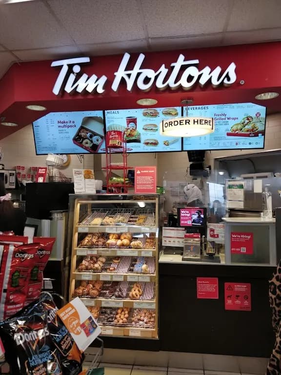 Tim Hortons storefront and interior at 4011 Dixie Rd, Mississauga, ON