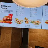 Tim Hortons storefront and interior at 4100 Dixie Rd, Mississauga, ON