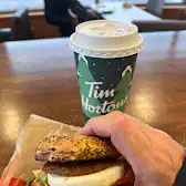 Tim Hortons storefront and interior at 4100 Dixie Rd, Mississauga, ON