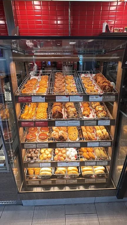 Tim Hortons storefront and interior at Taxi Stand For Drivers Located At 6301 Silver Dart Drive Cvha Building, Mississauga, ON
