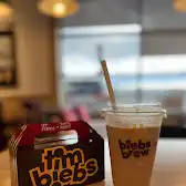 Tim Hortons storefront and interior at 6767 Airport Rd, Mississauga, ON