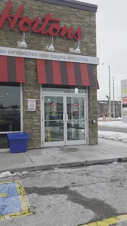 Tim Hortons storefront and interior at 7195 Goreway Dr, Mississauga, ON