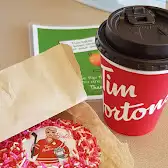 Tim Hortons storefront and interior at 235 Ontario Rd, Mitchell, ON
