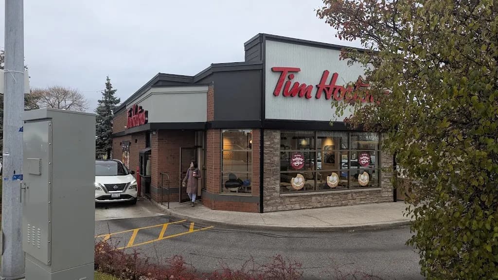 Tim Hortons storefront and interior at 1900 O'connor Dr, North York, ON