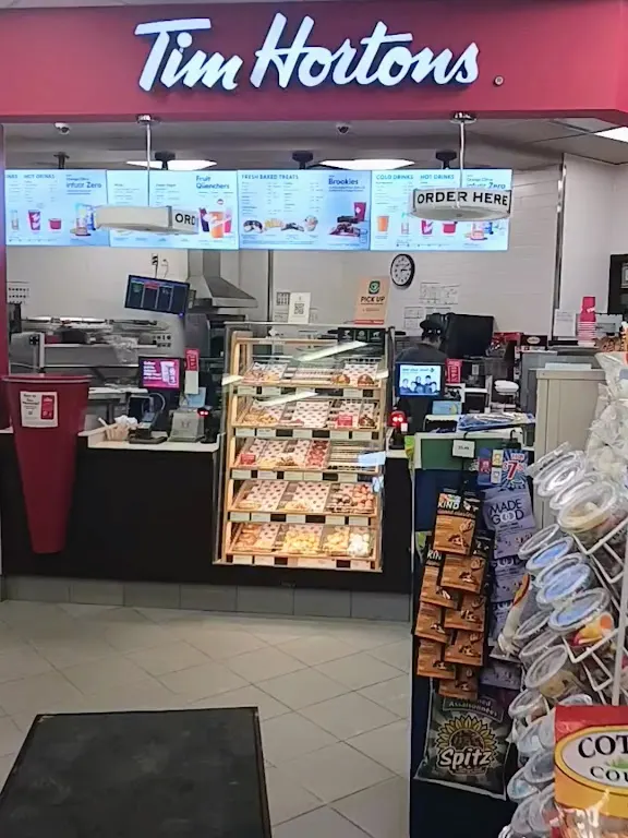 Tim Hortons storefront and interior at 3309 Simcoe St, Oshawa, ON