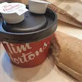 Tim Hortons storefront and interior at 171 Slater St, Ottawa, ON
