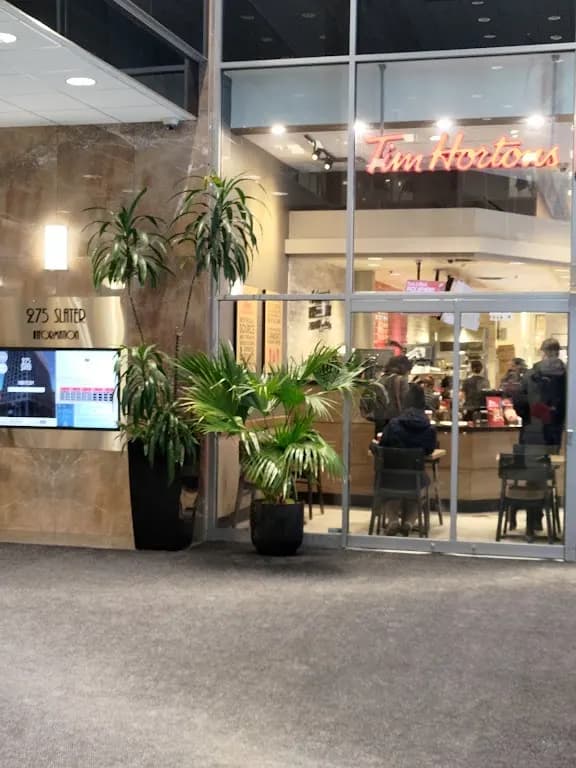 Tim Hortons storefront and interior at 275 Slater St, Ottawa, ON
