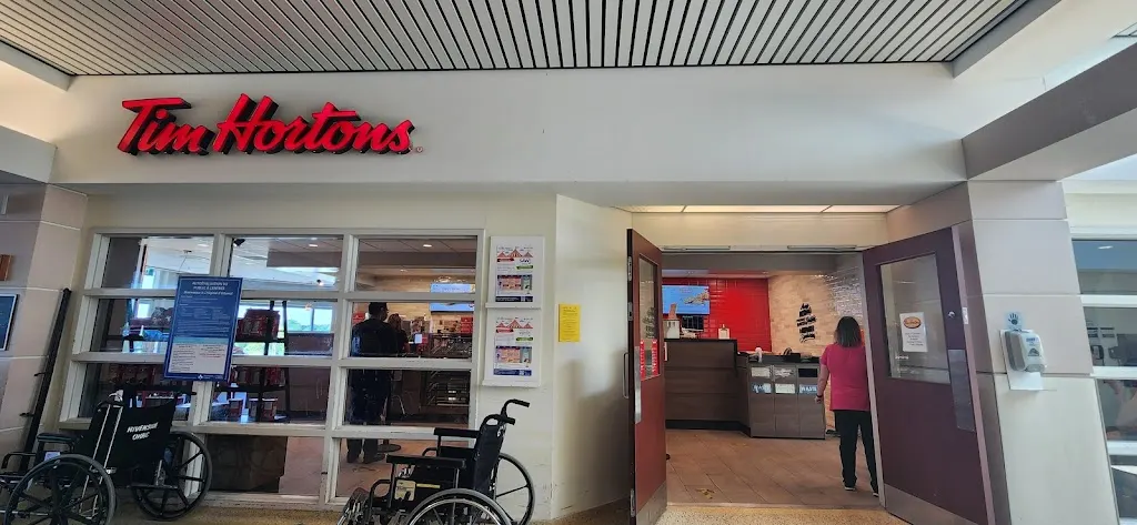 Tim Hortons storefront and interior at 1967 Riverside Drive, Ottawa, ON
