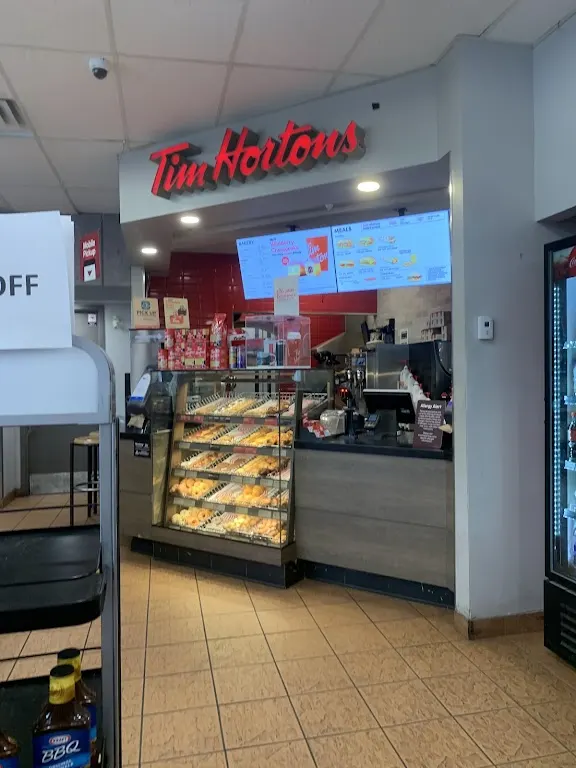 Tim Hortons storefront and interior at 3580 Strandherd Dr, Ottawa, ON