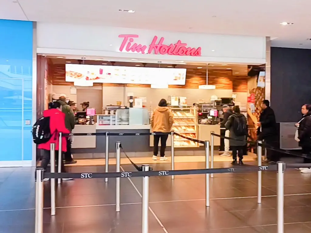 Tim Hortons storefront and interior at 300 Borough Dr, Scarborough, ON