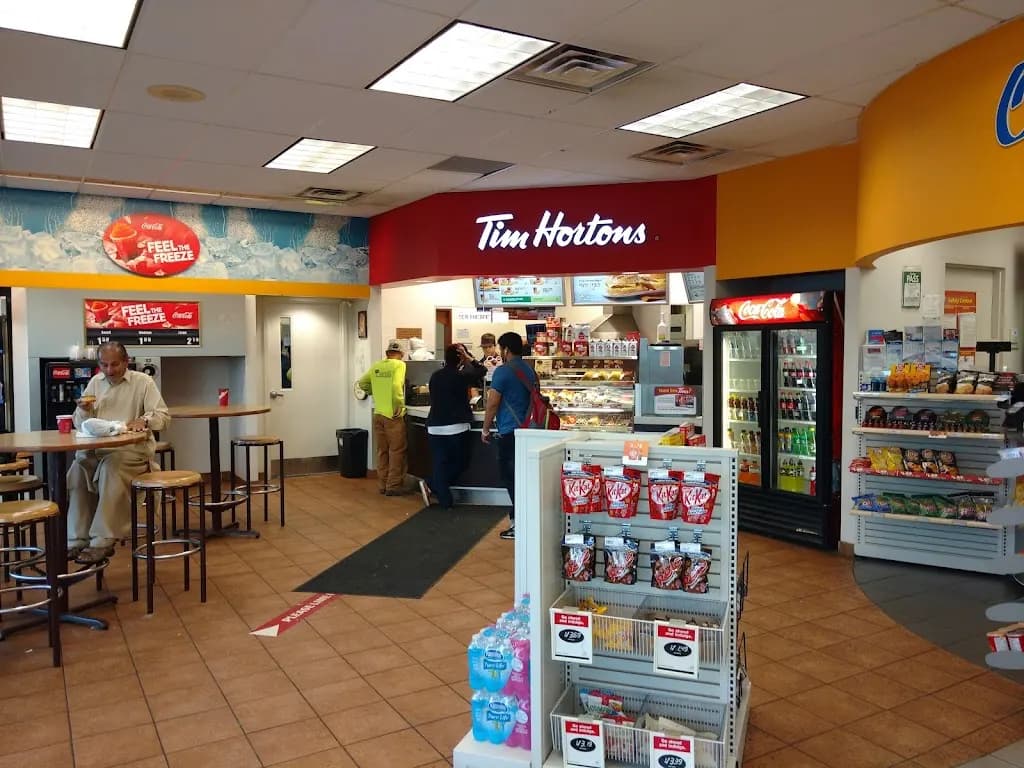 Tim Hortons storefront and interior at 1150 Markham Road, Scarborough, ON