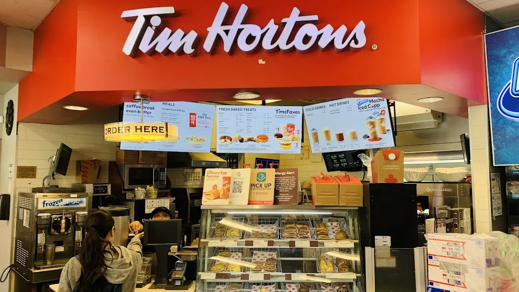 Tim Hortons storefront and interior at 1641 Markham Rd, Scarborough, ON