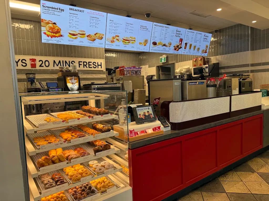 Tim Hortons storefront and interior at 1670 Mccowan Rd, Scarborough, ON