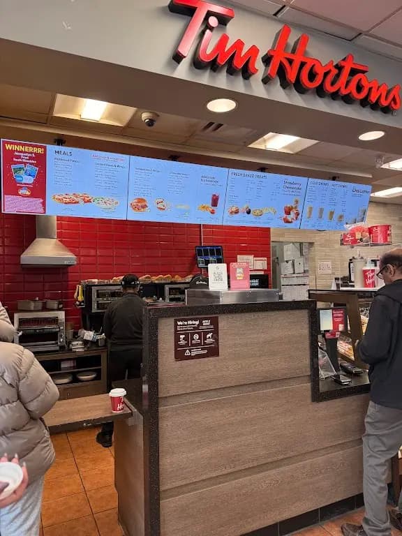 Tim Hortons storefront and interior at 5975 Steeles Ave E, Scarborough, ON