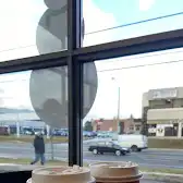 Tim Hortons storefront and interior at 8129 Sheppard Ave, Scarborough, ON