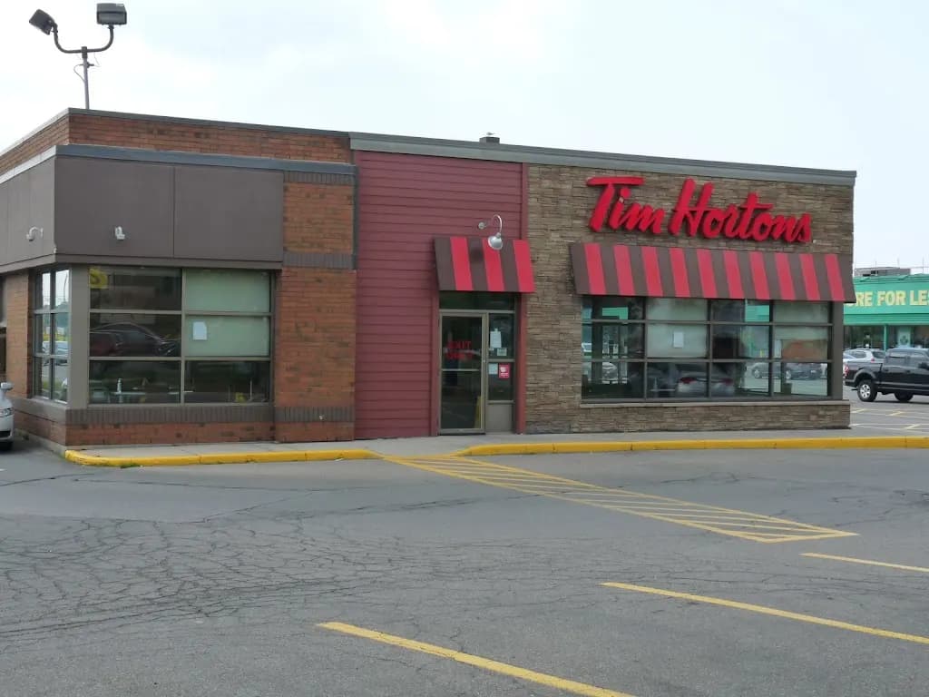 Tim Hortons storefront and interior at 275 Geneva St, St Catharines, ON