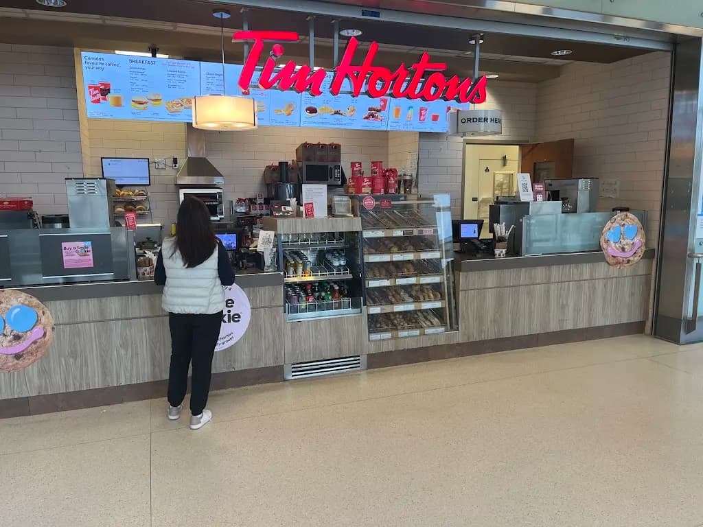 Tim Hortons storefront and interior at 1 Bridgepoint Dr., Toronto, ON