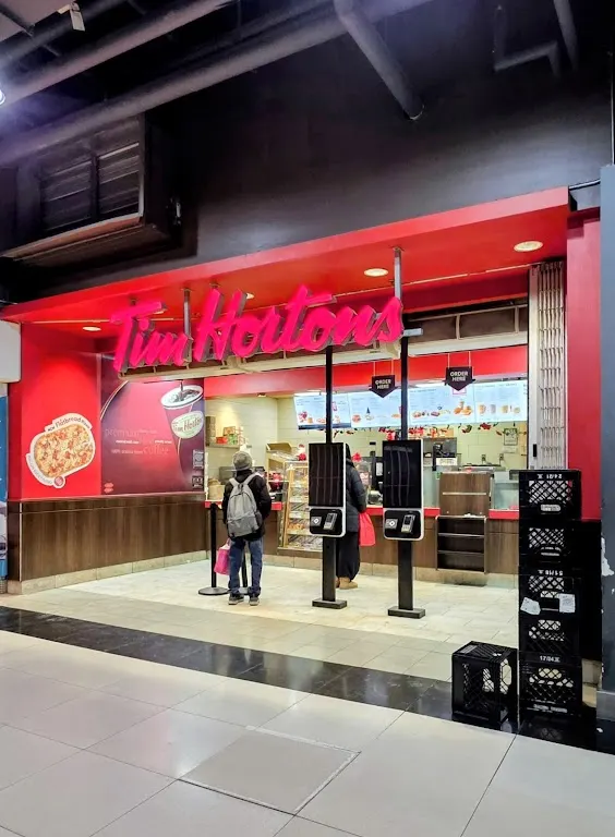Tim Hortons storefront and interior at 10 Dundas St E Suite 104, Toronto, ON