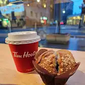 Tim Hortons storefront and interior at 18 Yorkville Avenue, Toronto, ON