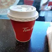 Tim Hortons storefront and interior at 20 Eglinton Ave West, Toronto, ON