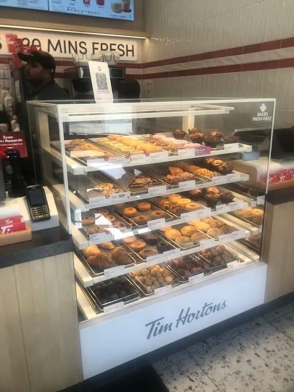 Tim Hortons storefront and interior at 28 Downes Street, Toronto, ON