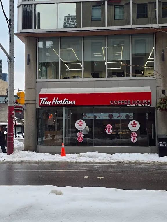 Tim Hortons storefront and interior at 33 Yonge St, Toronto, ON