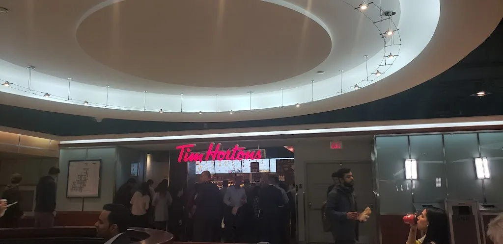 Tim Hortons storefront and interior at 40 King St W, Toronto, ON