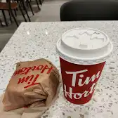 Tim Hortons storefront and interior at 40 King St W, Toronto, ON