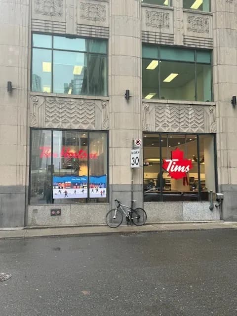 Tim Hortons storefront and interior at 55 York St, Toronto, ON