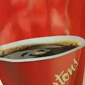 Tim Hortons storefront and interior at 65 Front Str. W, Toronto, ON