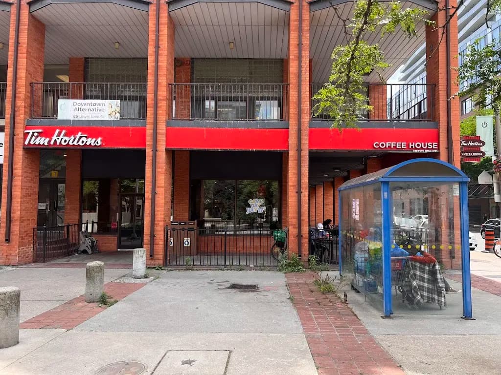 Tim Hortons storefront and interior at 77 Lower Jarvis, Toronto, ON