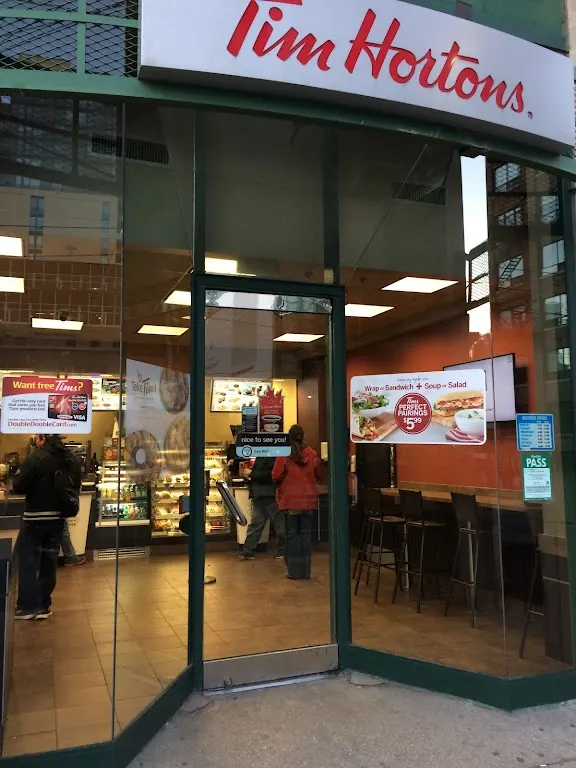 Tim Hortons storefront and interior at 119 Spadina Ave, Toronto, ON