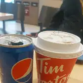 Tim Hortons storefront and interior at 119 Spadina Ave, Toronto, ON