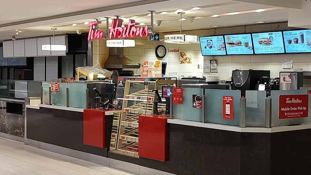 Tim Hortons storefront and interior at 120 Adelaide St W Unit Fc-09, Toronto, ON