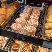 Tim Hortons storefront and interior at 150 Wynford Dr, Toronto, ON
