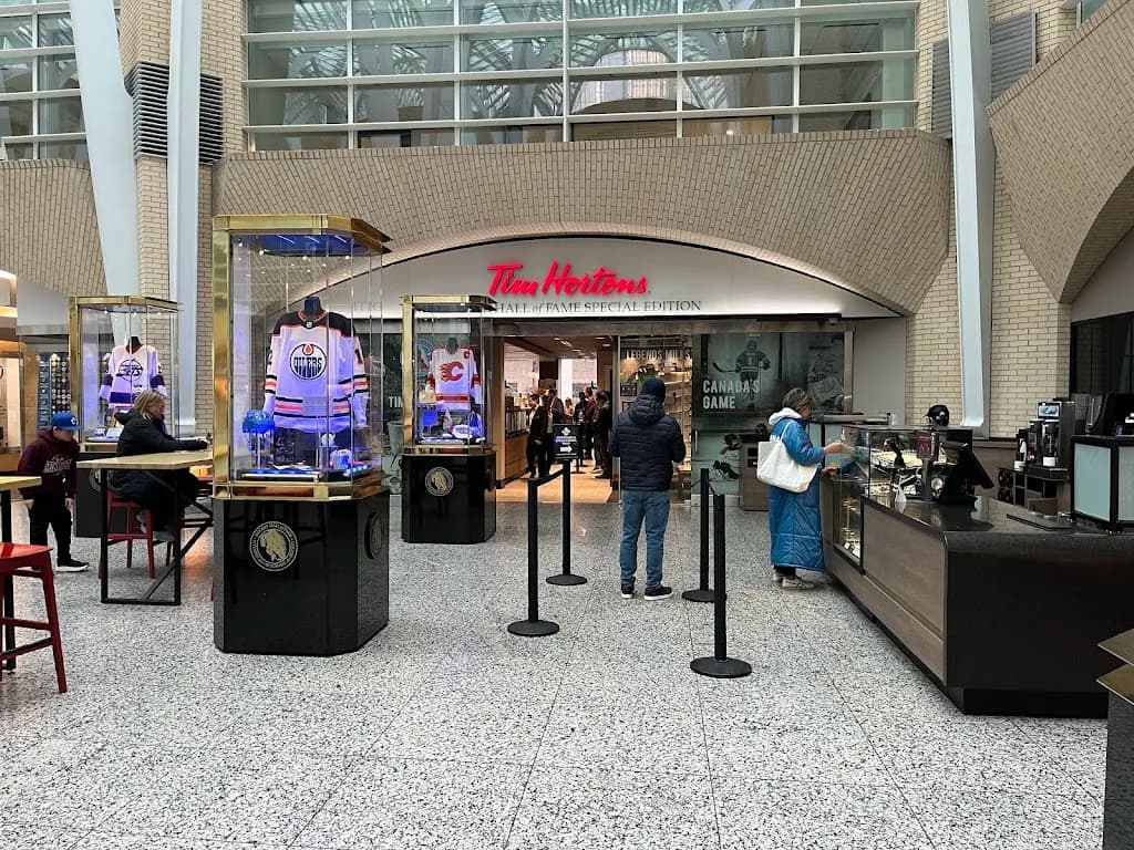 Tim Hortons storefront and interior at 181 Bay St, Toronto, ON