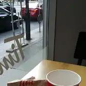 Tim Hortons storefront and interior at 181 Bay St, Toronto, ON