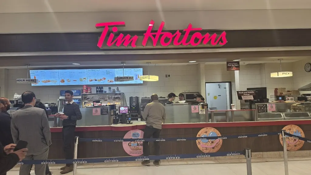 Tim Hortons storefront and interior at 200 Wellington St. W. (metro Centre), Toronto, ON