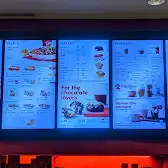 Tim Hortons storefront and interior at 218 Yonge St, Toronto, ON