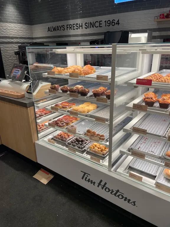 Tim Hortons storefront and interior at 323 Richmond Street East, Toronto, ON