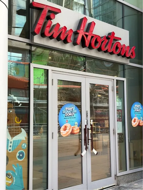 Tim Hortons storefront and interior at 375 King Street West, Toronto, ON