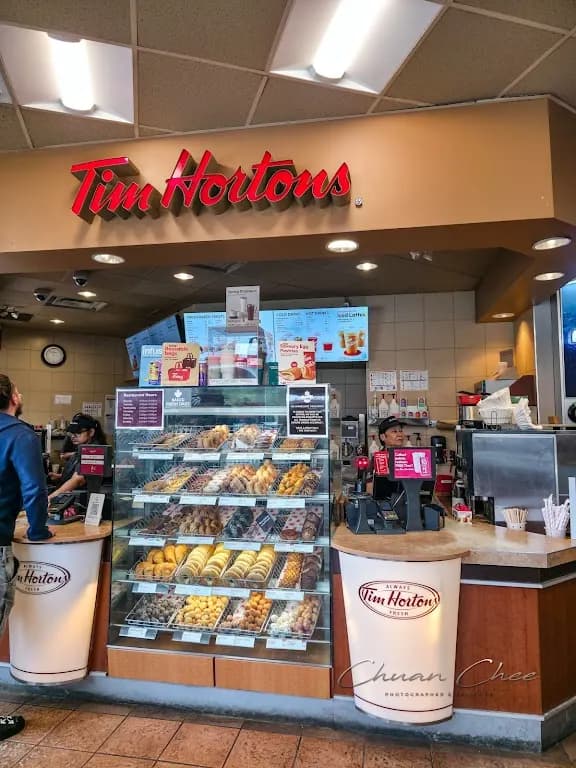 Tim Hortons storefront and interior at 381 Mount Pleasant Rd, Toronto, ON