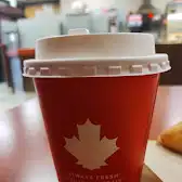 Tim Hortons storefront and interior at 477 Dundas St West, Toronto, ON