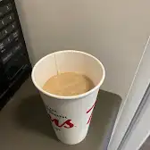 Tim Hortons storefront and interior at 547 Gerrard St East, Toronto, ON