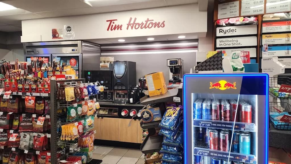 Tim Hortons storefront and interior at 553 Lakeshore Rd West, Toronto, ON