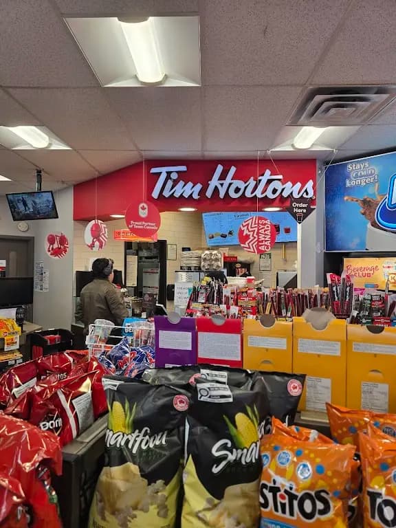 Tim Hortons storefront and interior at 561 O' Connor Dr, Toronto, ON